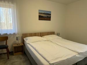 Postel nebo postele na pokoji v ubytování Resort Vila Credo