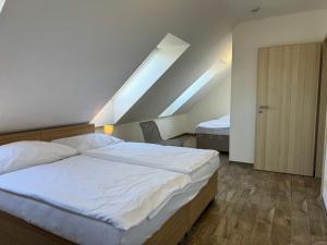 Postel nebo postele na pokoji v ubytování Resort Vila Credo