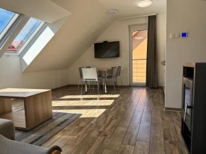 TV a/nebo společenská místnost v ubytování Resort Vila Credo