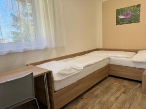 Postel nebo postele na pokoji v ubytování Resort Vila Credo
