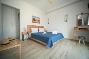 Postel nebo postele na pokoji v ubytování Elixrysos Apartment 1