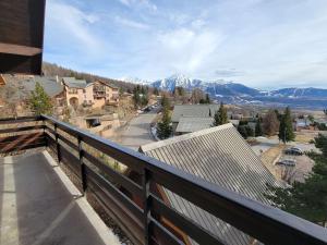 a balcony of a house with a view of the mountains at Chalet Saint-Michel-de-Chaillol, 3 pièces, 5 personnes - FR-1-393-89 in Saint-Michel-de-Chaillol