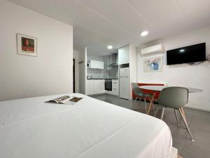 A television and/or entertainment centre at Agi Arago Studio