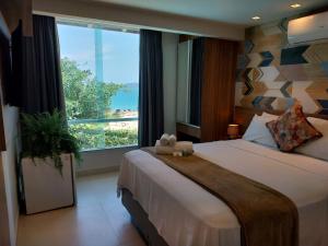 Postel nebo postele na pokoji v ubytování Hotel Pousada Casacolina