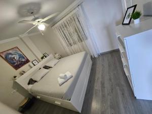 Een bed of bedden in een kamer bij Apartamento Sara
