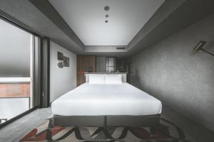 SAPPORO STREAM HOTEL客房内的一张或多张床位
