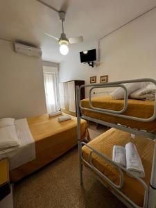 Postel nebo postele na pokoji v ubytování Hotel Till