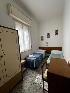 Postel nebo postele na pokoji v ubytování Hotel Till