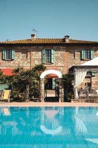 The swimming pool at or close to Podere Gli Olmi