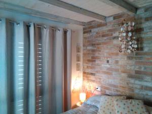 A bed or beds in a room at Oltre le Dune