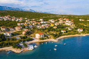 an aerial view of a small island in a body of water at HOLIDAY HOME LUANA in Maslenica