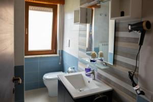 Koupelna v ubytování Vitti Apartment