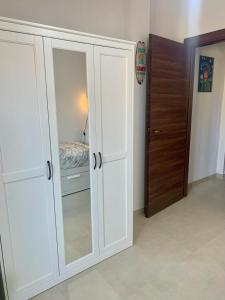 Postel nebo postele na pokoji v ubytování Vitti Apartment