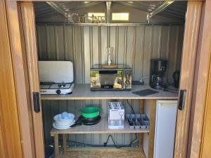 Kuchnia lub aneks kuchenny w obiekcie camping hôtel les airelles