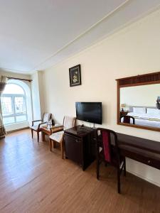 TV a/nebo společenská místnost v ubytování ANH ĐÀO HOTEL