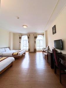TV a/nebo společenská místnost v ubytování ANH ĐÀO HOTEL