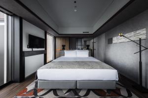 SAPPORO STREAM HOTEL客房内的一张或多张床位