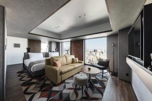 SAPPORO STREAM HOTEL的电视和/或娱乐中心