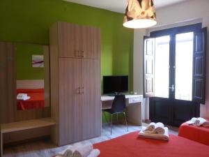 Postel nebo postele na pokoji v ubytování B&B Al Centro