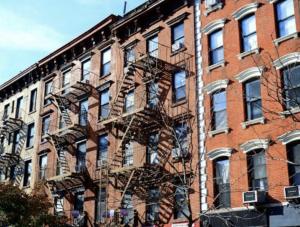a fire escapes on the side of a brick building at Apartment near Union Square in New York
