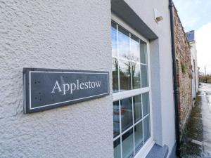 a sign on the side of a building at Applestow in Bideford