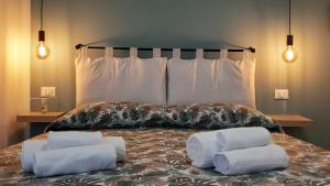 Ліжко або ліжка в номері A Casa di Tony