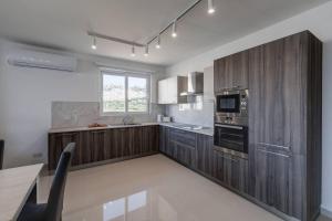 Cuina o zona de cuina de 9ten11 Seafront By Homely