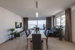Zona d'estar a 9ten11 Seafront By Homely