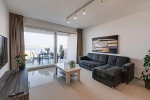 Zona d'estar a 9ten11 Seafront By Homely