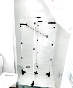 a glass shower in a bathroom with a toilet at Maison d'une chambre avec jardin clos et wifi a Tonnay Charente in Tonnay-Charente