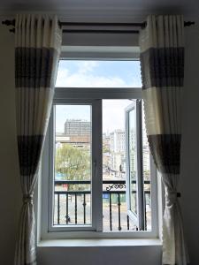 Balkón nebo terasa v ubytování ANH ĐÀO HOTEL + 37 fotografií