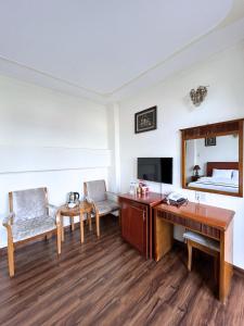 TV a/nebo společenská místnost v ubytování ANH ĐÀO HOTEL