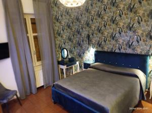 Postel nebo postele na pokoji v ubytování B&B Mini Hotel Incity-close train station and port-