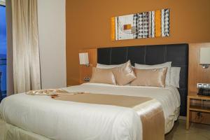 Prestige Hotel & Spa客房内的一张或多张床位