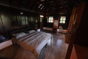 Voodi või voodid majutusasutuse Mount De Kumarakom - Heritage Homestay toas