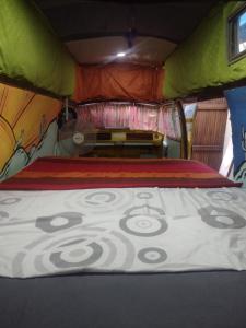a bed in the back of a bus at OlasHostel in Mendoza