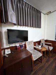 TV a/nebo společenská místnost v ubytování ANH ĐÀO HOTEL