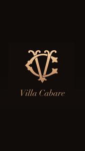 a gold logo with a letter viii caraffe at VILLA CABARE Apartments&Rooms in Durrës