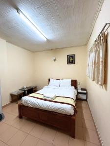 Postel nebo postele na pokoji v ubytování ANH ĐÀO HOTEL