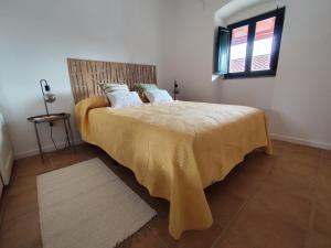 Posteľ alebo postele v izbe v ubytovaní Vila Nova Guest House