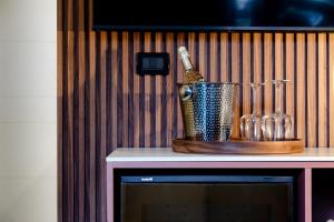 a bottle of beer in a bucket on a table at Venice Suite San Marco 213 in Venice