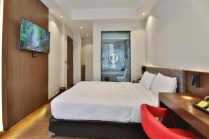 Letto o letti in una camera di Lakhey Hotel