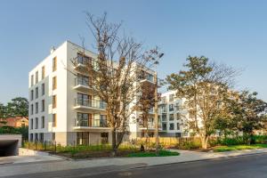 an apartment building on the side of a street at Apartament Fauna- blisko morza in Gdańsk