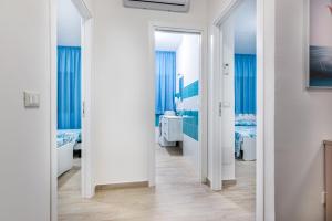 Ένα ή περισσότερα κρεβάτια σε δωμάτιο στο Agio Apartments Diamante - Trilocale Standard