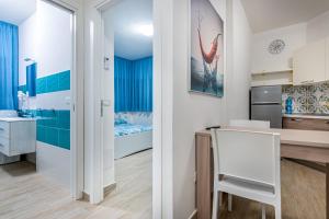 Η κουζίνα ή μικρή κουζίνα στο Agio Apartments Diamante - Trilocale Standard +10 φωτογραφίες