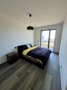 Postel nebo postele na pokoji v ubytování Yellow Uptown 70 - Fiera Milano + 27 fotografií
