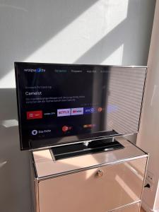 TV a/nebo společenská místnost v ubytování Heimathafen Wiek + 8 fotografií
