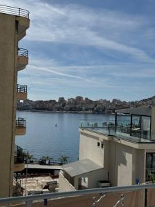 a view of a body of water from a building at Comfort Apartments Promenade in Sarandë
