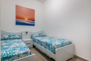 Katil atau katil-katil dalam bilik di Agio Apartments Diamante - Trilocale Superior