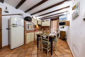 Η κουζίνα ή μικρή κουζίνα στο CarMa Apartment +5 φωτογραφίες